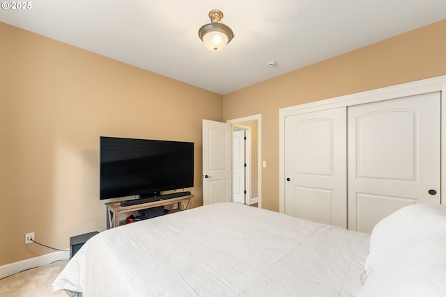 3356 NW 153rd Ter, Portland, OR 97229 - carpeted bedroom featuring baseboards and a closet