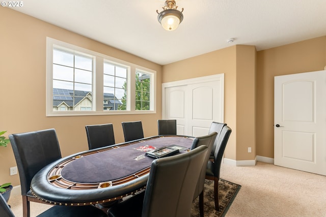 3356 NW 153rd Ter, Portland, OR 97229 - carpeted dining area featuring a desk and baseboards
