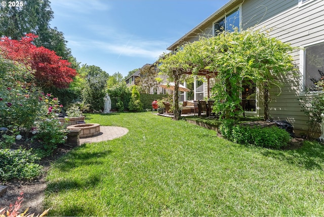 3356 NW 153rd Ter, Portland, OR 97229 - view of green lawn featuring a fire pit and a patio area