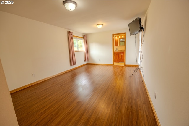 745 N 8th St, Lakeside, OR 97449 - unfurnished room with light wood-style floors and baseboards
