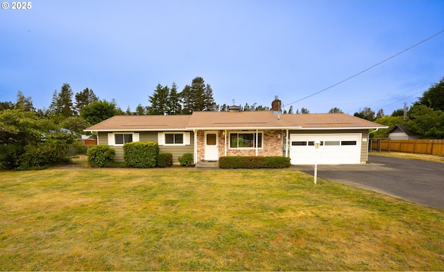 745 N 8th St, Lakeside, OR 97449 - ranch-style house with asphalt driveway, a chimney, and a garage