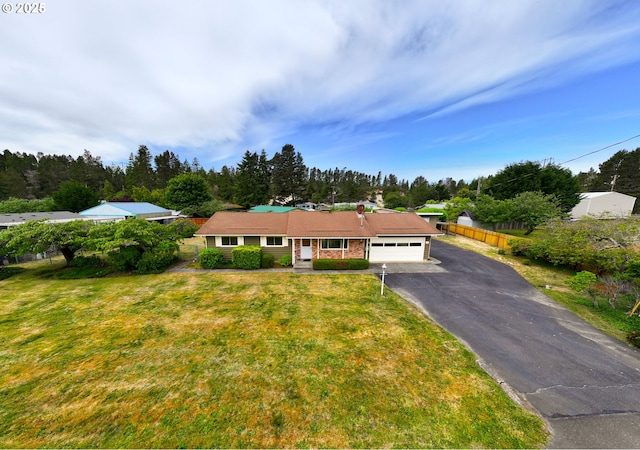 745 N 8th St, Lakeside, OR 97449 - ranch-style home featuring driveway, an attached garage, and view of scattered trees
