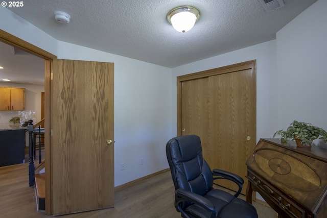 14604 NW 7th Pl, Vancouver, WA 98685 - office area featuring wood finished floors and baseboards