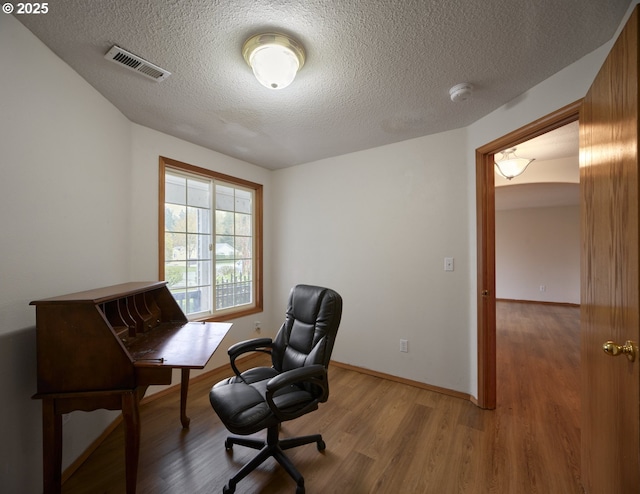 14604 NW 7th Pl, Vancouver, WA 98685 - home office with light wood-type flooring and a textured ceiling