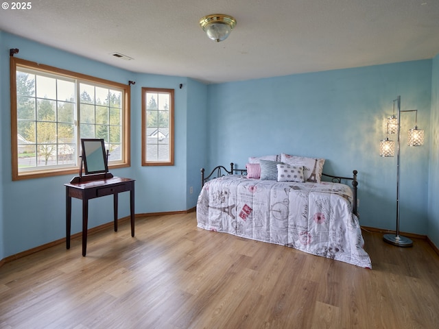 14604 NW 7th Pl, Vancouver, WA 98685 - bedroom with wood finished floors and baseboards