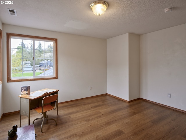 14604 NW 7th Pl, Vancouver, WA 98685 - office area featuring light wood-style floors and a textured ceiling