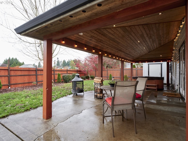 14604 NW 7th Pl, Vancouver, WA 98685 - fenced backyard with a hot tub, a patio, and outdoor dining area