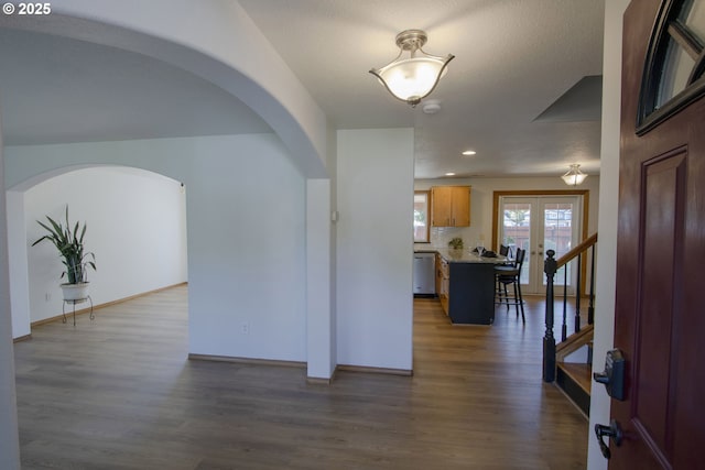 14604 NW 7th Pl, Vancouver, WA 98685 - entrance foyer featuring dark wood-style flooring, recessed lighting, and arched walkways