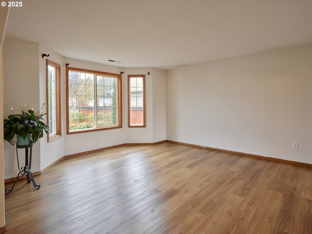14604 NW 7th Pl, Vancouver, WA 98685 - empty room featuring light wood finished floors and baseboards