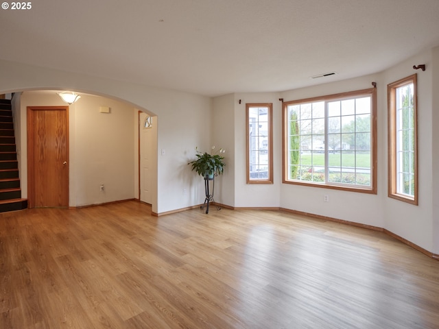 14604 NW 7th Pl, Vancouver, WA 98685 - spare room with light wood finished floors, stairway, and arched walkways