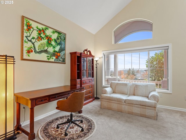 home office with carpet floors, high vaulted ceiling, and baseboards