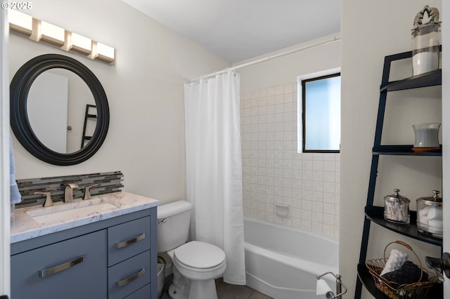 bathroom featuring toilet, shower / bath combination with curtain, tile patterned flooring, and vanity