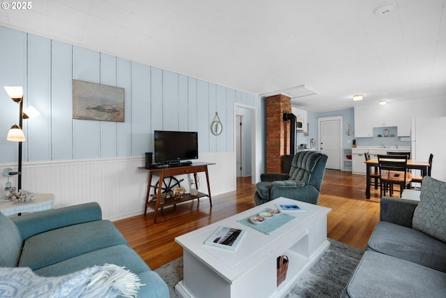 living room with wood finished floors