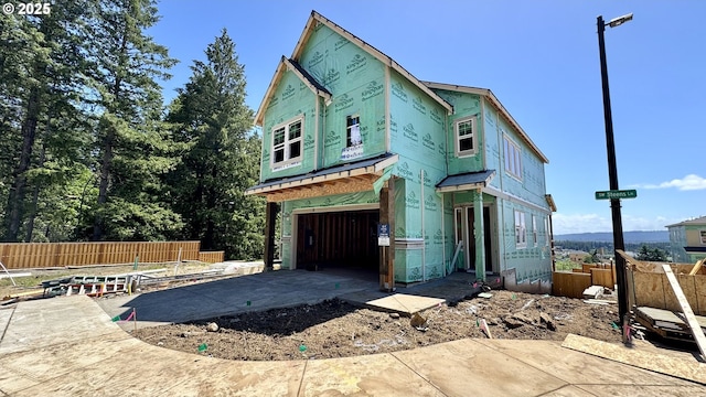 17590 SW Steens Ln, Beaverton, OR 97007 - view of front facade featuring driveway and a garage