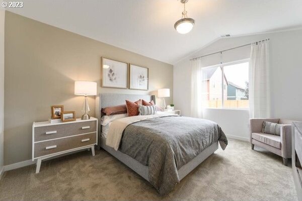1486 N Millican Creek St, Lafayette, OR 97127 - carpeted bedroom featuring vaulted ceiling and baseboards