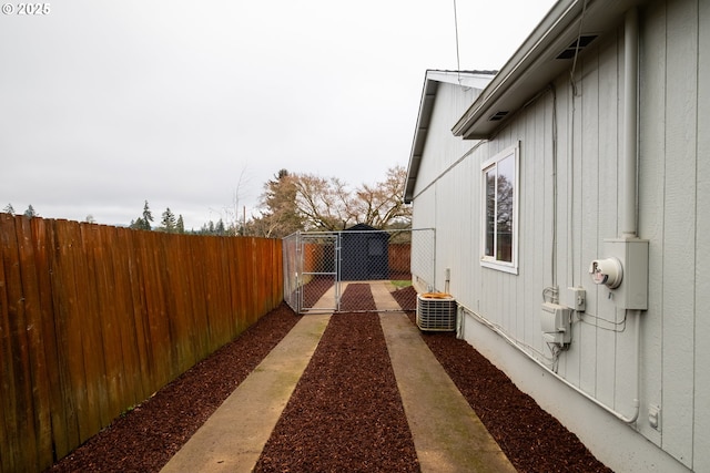 view of side of home featuring cooling unit