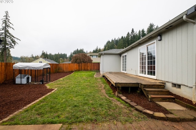 view of yard featuring a wooden deck