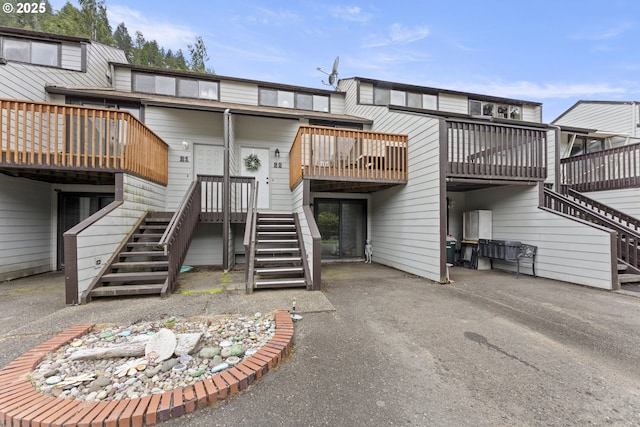 43605 State Highway 38 Unit 22, Reedsport, OR 97467 - view of building exterior with stairway and driveway