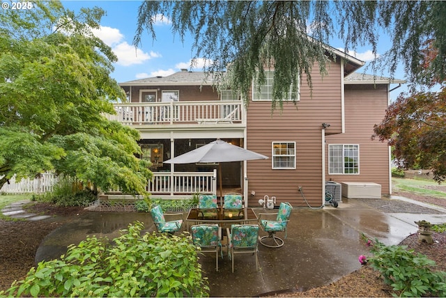 14504 SE Old Barn Ln, Damascus, OR 97089 - rear view of property featuring a balcony, a patio, and central air condition unit