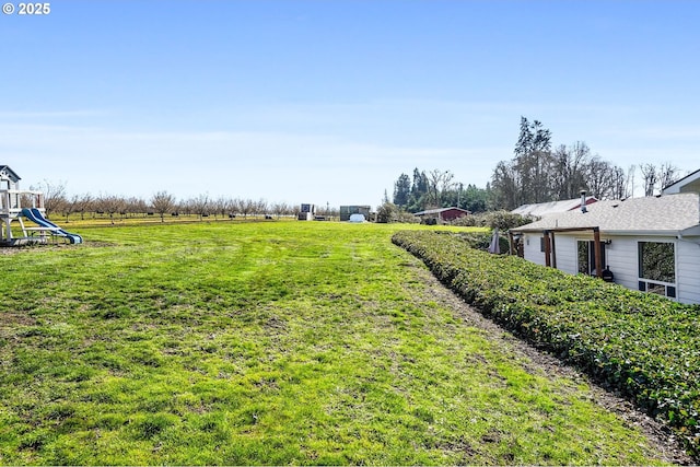 view of yard with a playground