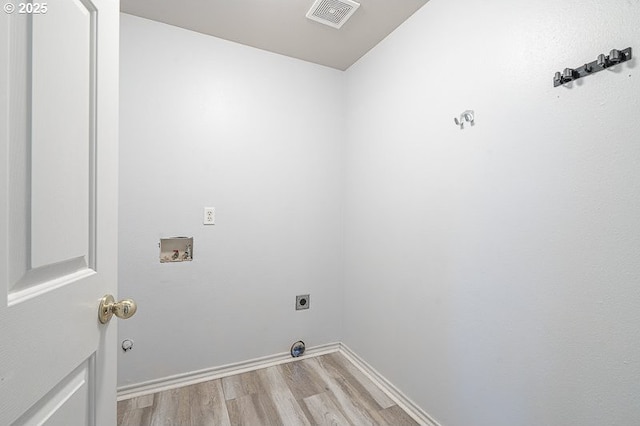 washroom featuring light wood finished floors, visible vents, washer hookup, laundry area, and hookup for an electric dryer