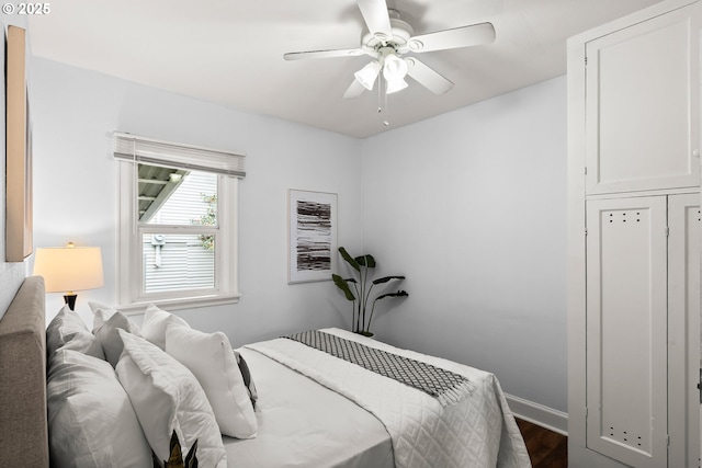 705 Jackson St, Oregon City, OR 97045 - bedroom featuring dark wood-style flooring, baseboards, and a ceiling fan