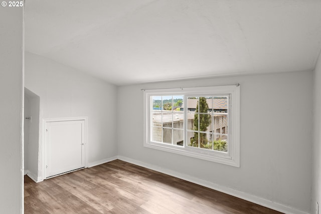 705 Jackson St, Oregon City, OR 97045 - spare room featuring wood finished floors and baseboards