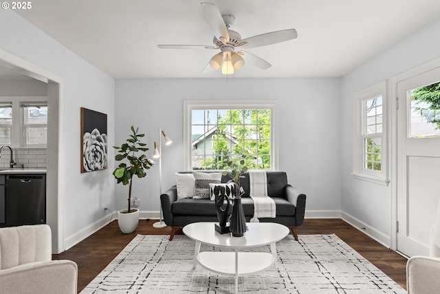 705 Jackson St, Oregon City, OR 97045 - living area with dark wood-style flooring, baseboards, and ceiling fan