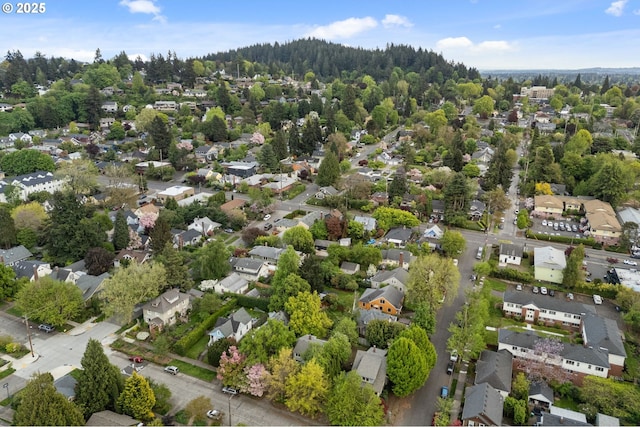 birds eye view of property with a residential view