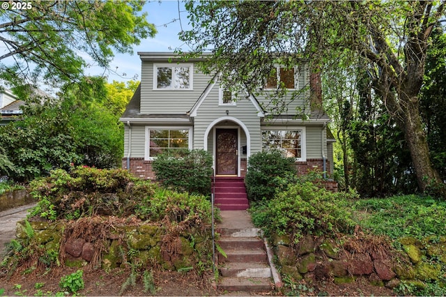 view of front of property with brick siding