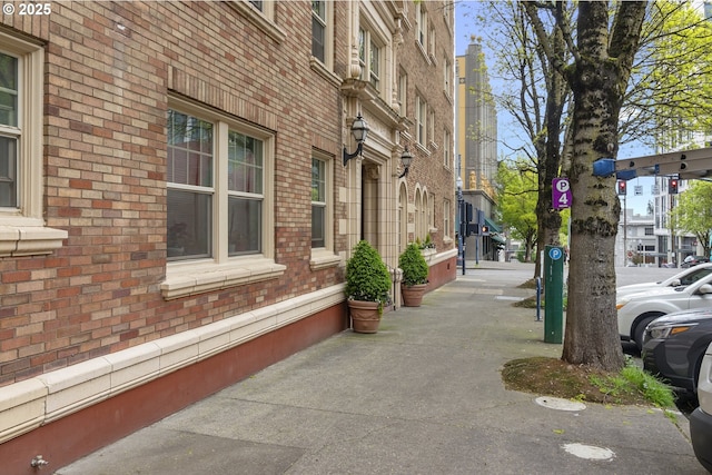 exterior space with brick siding