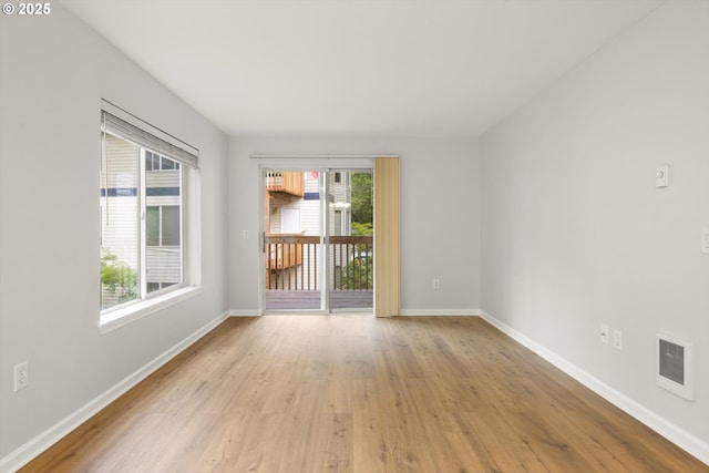 5130 SW Multnomah Blvd Unit H, Portland, OR 97219 - empty room with light wood finished floors and baseboards