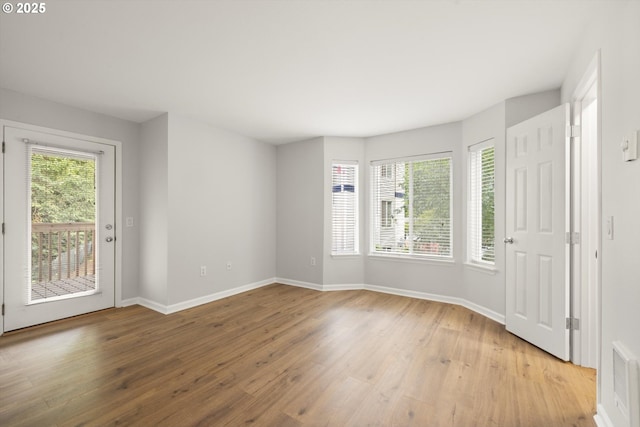 5130 SW Multnomah Blvd Unit H, Portland, OR 97219 - unfurnished room featuring light wood finished floors and baseboards