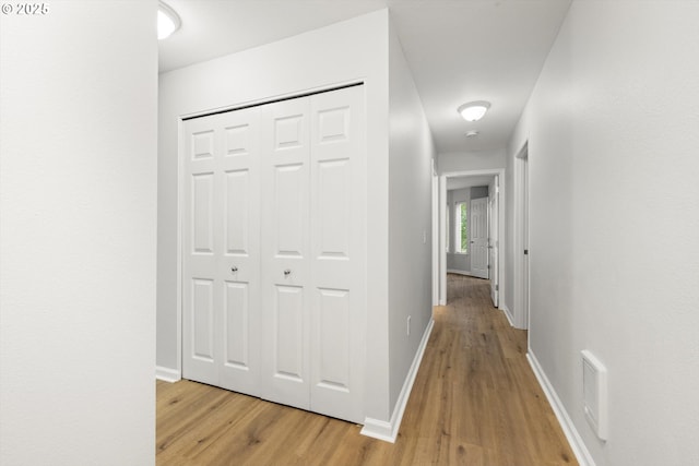 5130 SW Multnomah Blvd Unit H, Portland, OR 97219 - corridor featuring light wood-type flooring