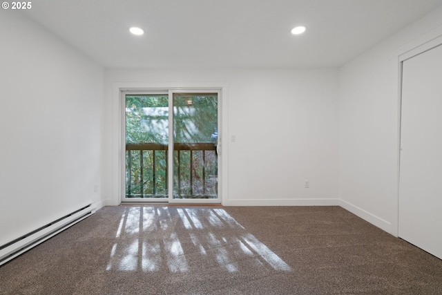 empty room featuring a baseboard radiator, carpet flooring, baseboards, and recessed lighting