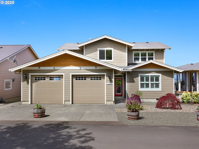 view of front of home featuring driveway and an attached garage