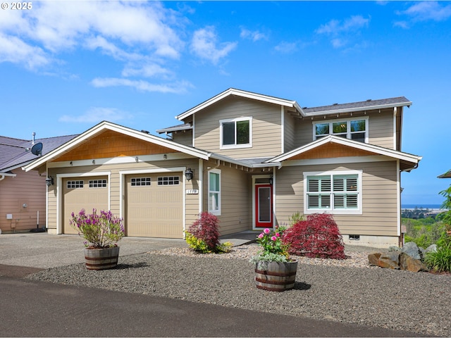 craftsman-style home with driveway and an attached garage