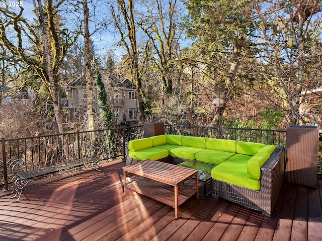 wooden terrace featuring an outdoor hangout area