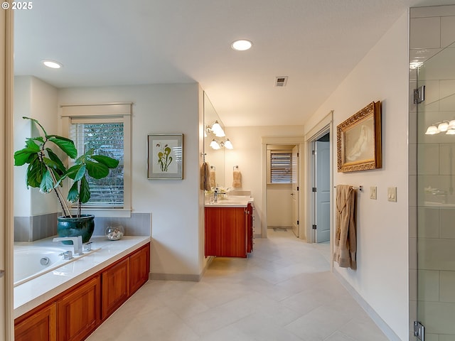 bathroom featuring vanity and plus walk in shower