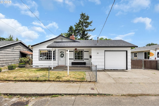 5414 SE 97th Ave, Portland, OR 97266 - ranch-style home with a garage, a fenced front yard, concrete driveway, a porch, and roof with shingles