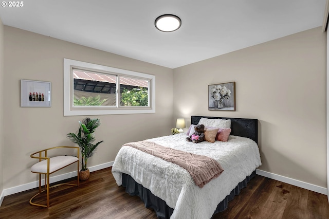 5414 SE 97th Ave, Portland, OR 97266 - bedroom featuring baseboards and wood finished floors