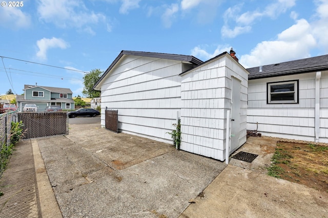 5414 SE 97th Ave, Portland, OR 97266 - view of side of home featuring a chimney