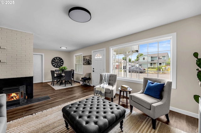 5414 SE 97th Ave, Portland, OR 97266 - living area with wood finished floors and a brick fireplace