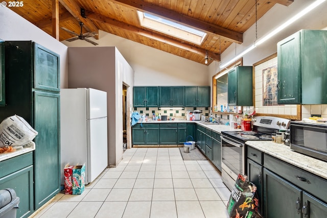 160 Holton Creek Rd, Kerby, OR 97531 - kitchen featuring stainless steel electric stove, freestanding refrigerator, green cabinetry, a wooden ceiling with exposed beams, and a skylight
