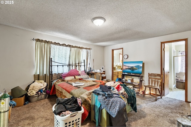 160 Holton Creek Rd, Kerby, OR 97531 - carpeted bedroom with a textured ceiling and ensuite bathroom