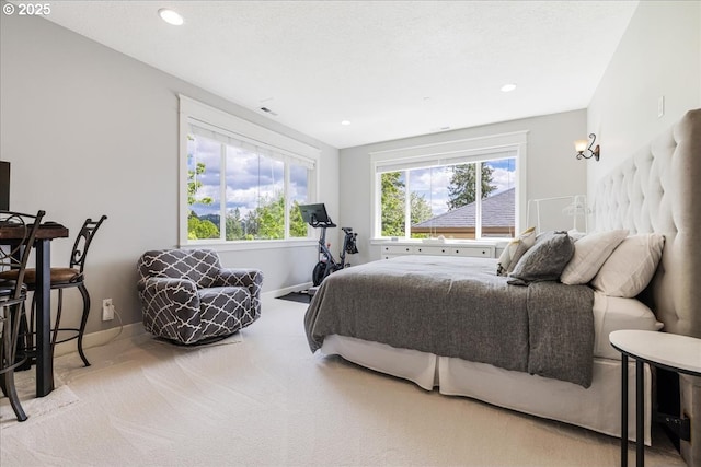 bedroom with baseboards, carpet flooring, and recessed lighting
