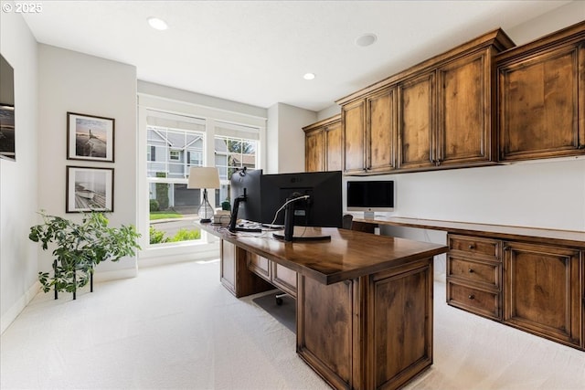 office space featuring baseboards, recessed lighting, and light colored carpet
