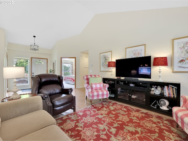 1689 Huckleberry Dr, Seaside, OR 97138 - living room with wood finished floors and high vaulted ceiling