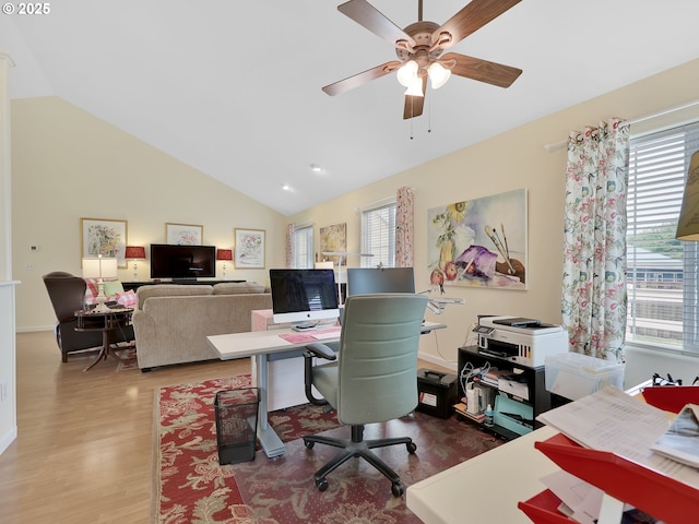 1689 Huckleberry Dr, Seaside, OR 97138 - office with vaulted ceiling, a ceiling fan, and wood finished floors