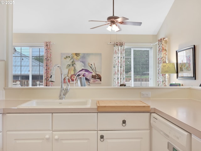 1689 Huckleberry Dr, Seaside, OR 97138 - kitchen with dishwasher, a sink, a ceiling fan, and light countertops